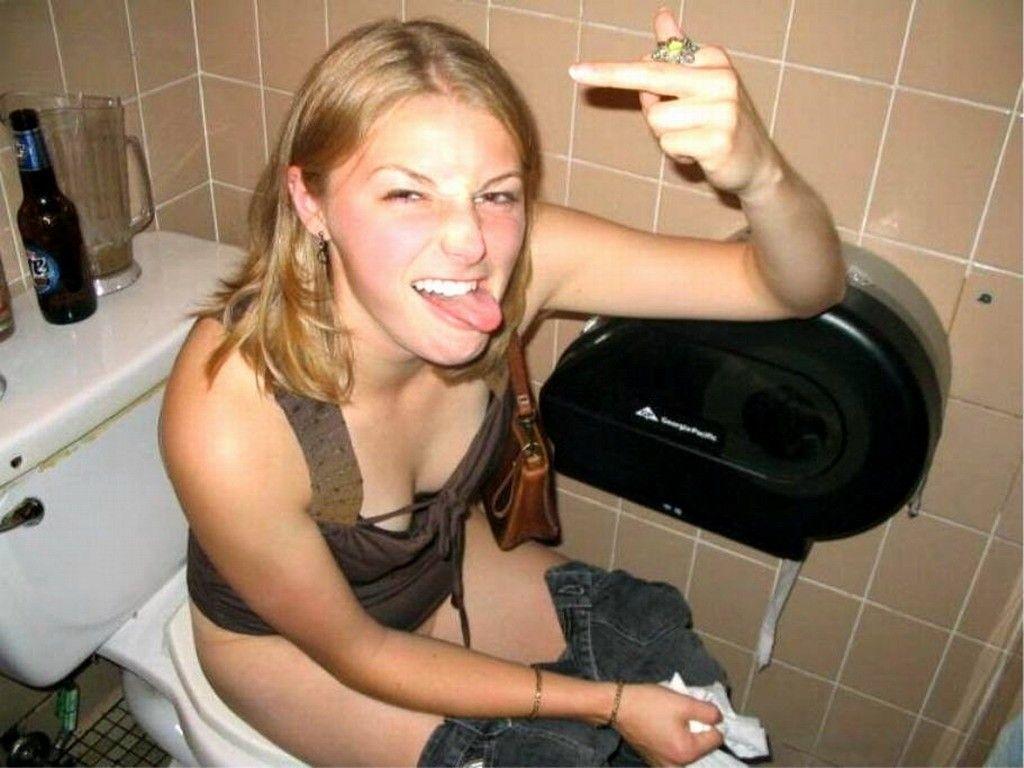 Nude ladies pissing in the toilet